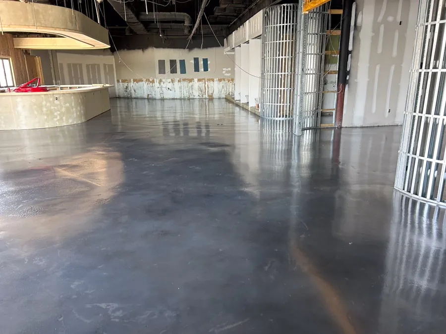 Dark polished concrete commercial floor, commercial epoxy flooring serving Nashville, TN